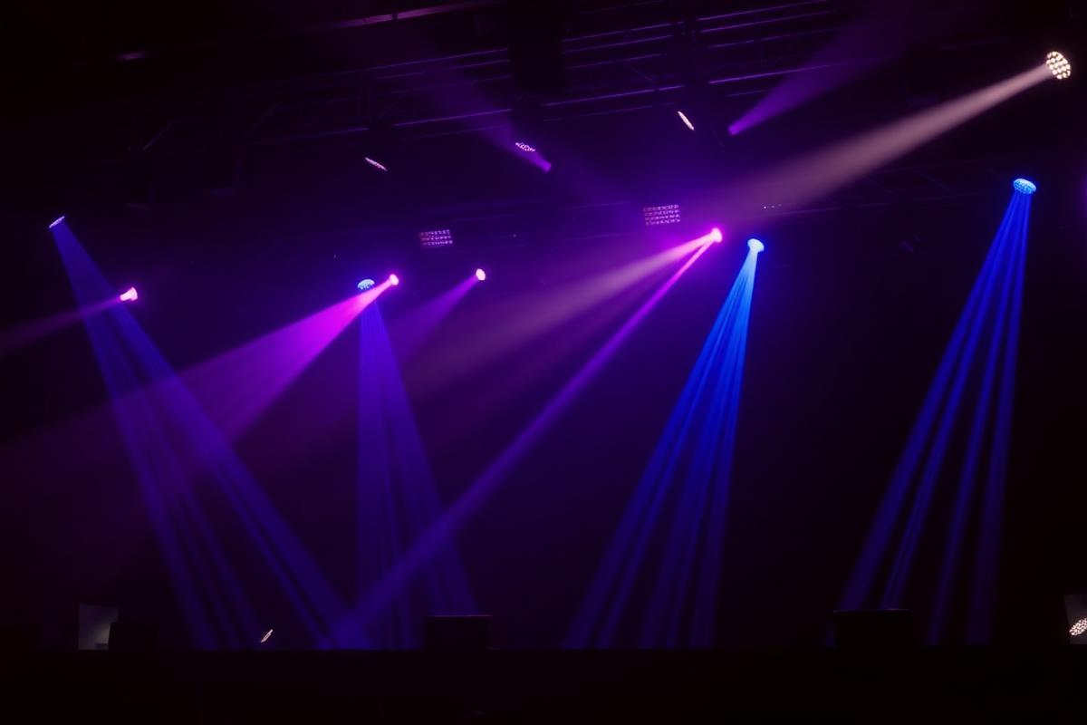Colourful stage lighting setup on dance floor